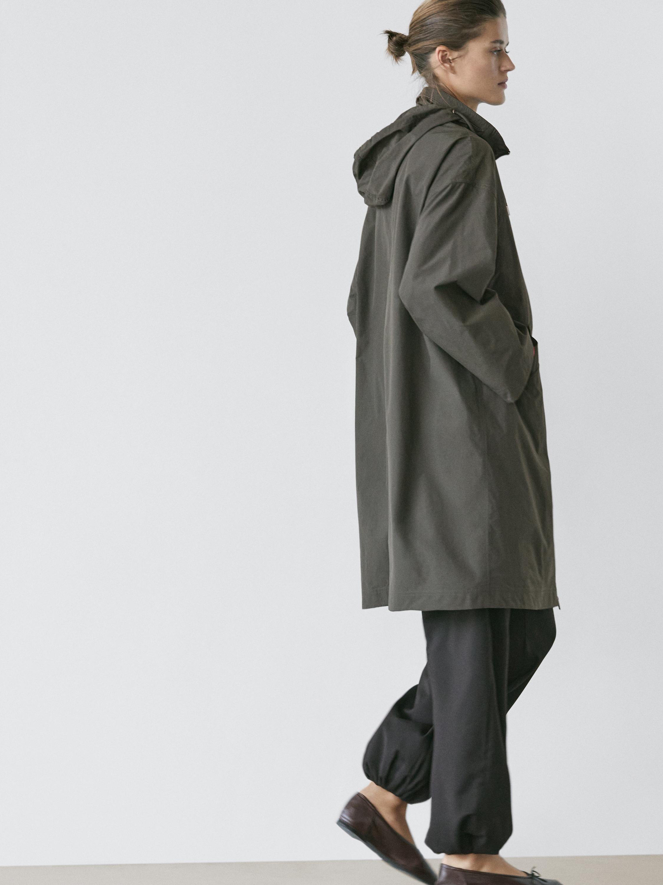 Trench tissu technique à capuche